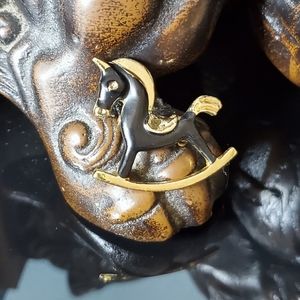 Vintage mid century goldtone and black enamel rocking horse brooch pin